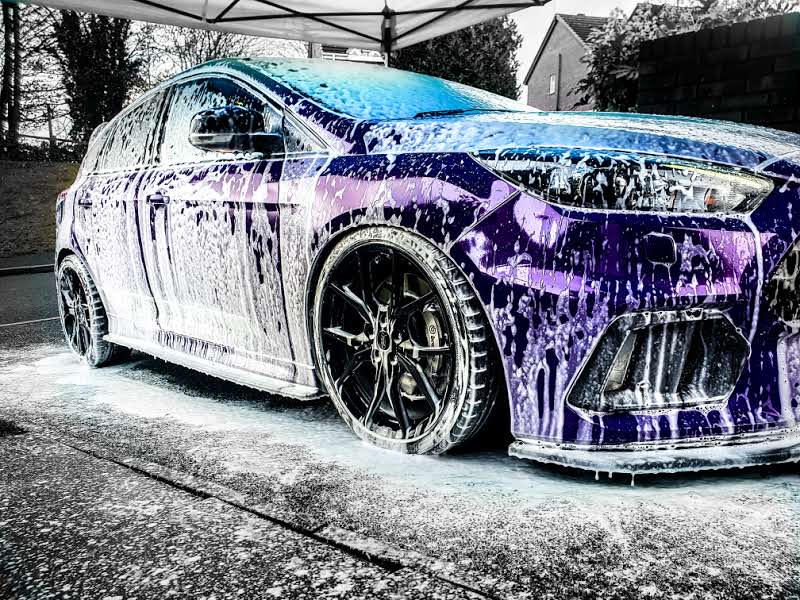 Nitrous blue to purple chameleon Ford Focus RS covered in snow foam